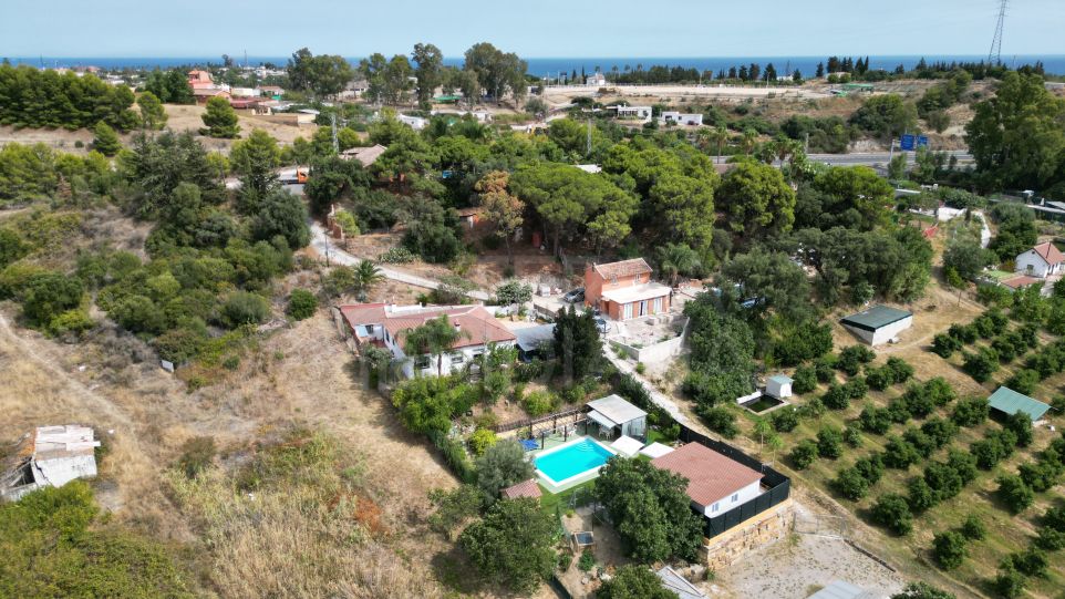 Finca with two independent houses on a large plot for sale near the centre of Estepona