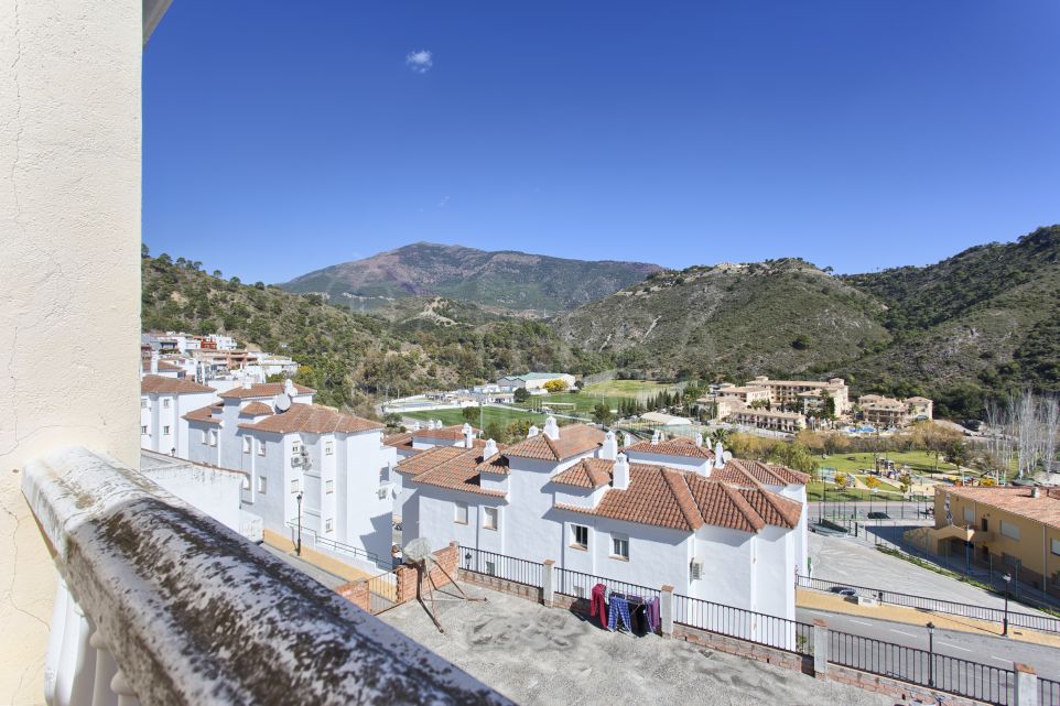 Spacious townhouse with panoramic views for sale in the heart of Benahavis town centre