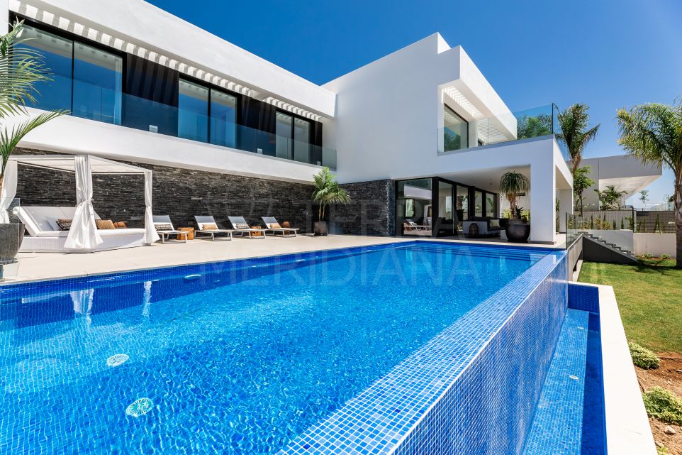 Striking contemporary villa with mesmerising coastal views for sale in Los Flamingos, Benahavis