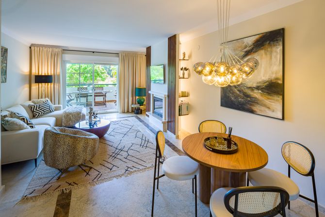 Stunning two bedroom south west facing elevated ground floor apartment in the heart of Marbella's Golden Mile