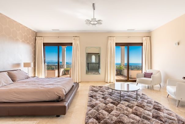 This elegant villa with subtle curb appeal and benefiting from excellent panoramic views