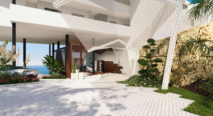 Landscaped entrance and arrival area at Carat in El Higuerón