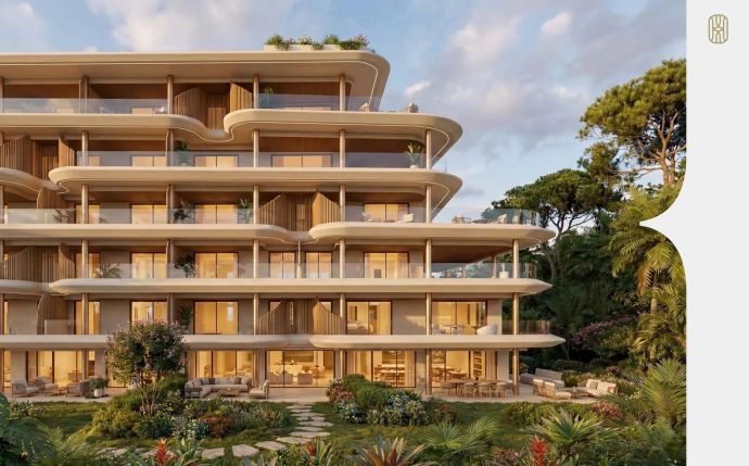 NAVEN Fuengirola apartment development with landscaped gardens and curved terraces