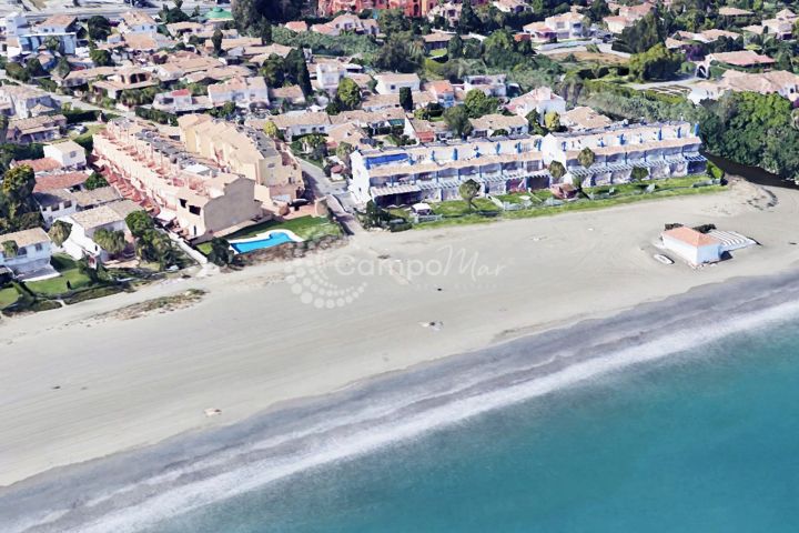 Estepona, Exclusive corner townhouse, on the first line of Saladillo Beach, facing south and with views of Gibraltar and Morocco.