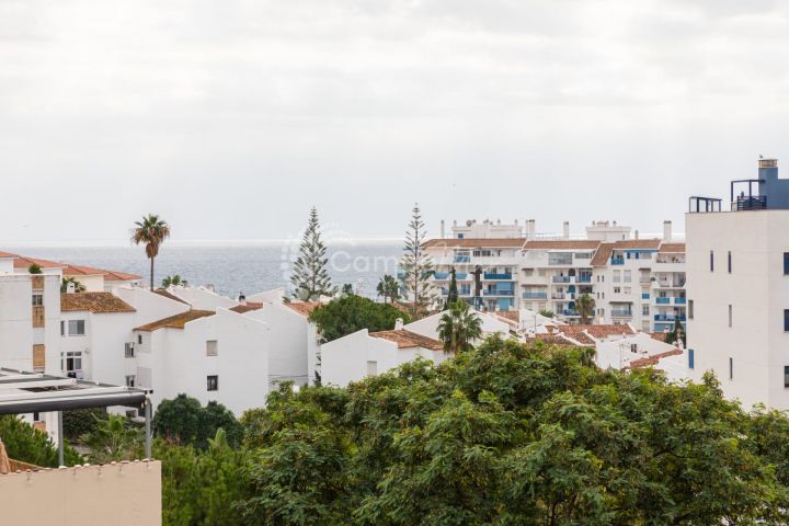 Estepona, Piso de 1 dormitorio con vistas al mar y garaje en Estepona