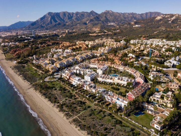 Rare opportunity to acquire a beachfront corner townhouse in Bahía de Marbella, East Marbella