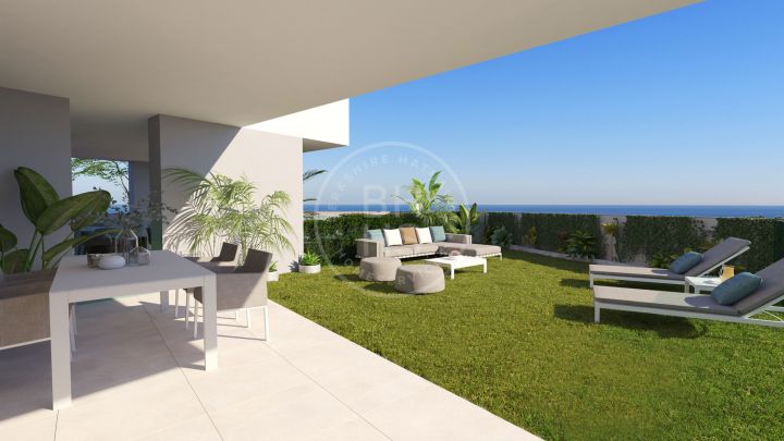 Stunning first-floor apartment in an off-plan development with views to the Mediterranean Sea and the beaches of Manilva