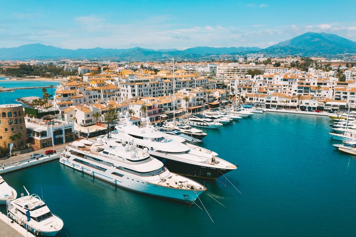 Aerial top view of luxury yachts in Puerto Banus marina, Marbella, Spain.