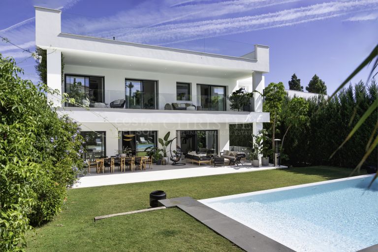 Luxury villa of modern elegance and unique location, bordering Puerto Banus, Marbella