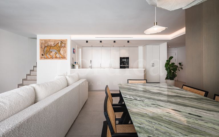 Modern takvåning med imponerande solarium