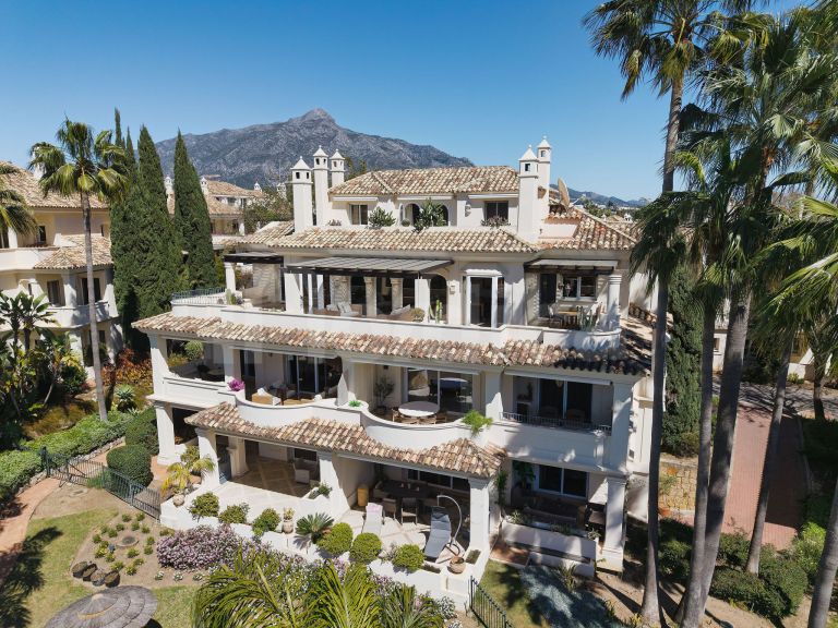 Elegant Duplex Penthouse with Panoramic Views and Expansive Terraces