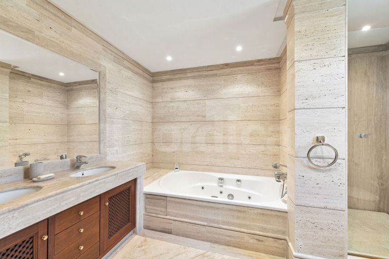 Elegant Duplex Penthouse with Panoramic Views and Expansive Terraces