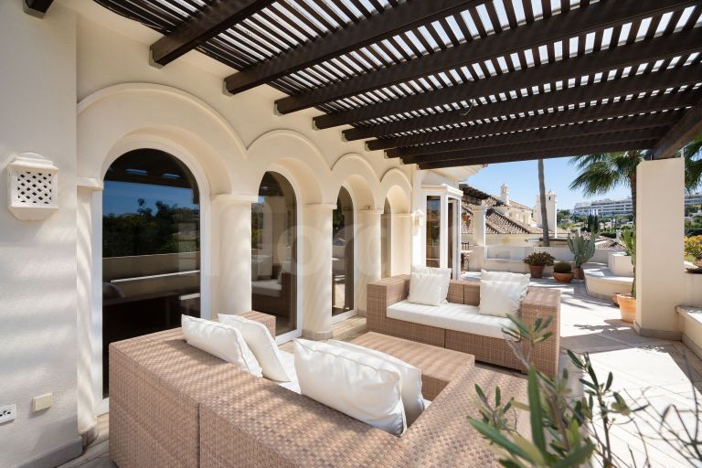 Elegant Duplex Penthouse with Panoramic Views and Expansive Terraces