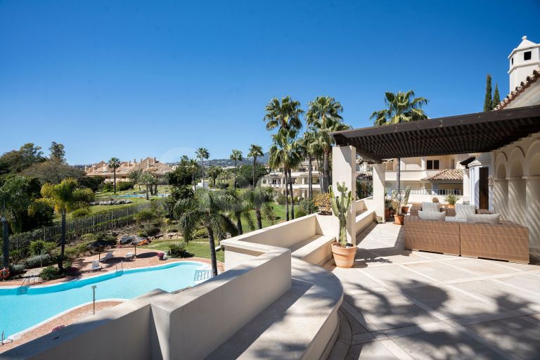 Elegant Duplex Penthouse with Panoramic Views and Expansive Terraces