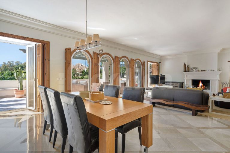 Elegant Duplex Penthouse with Panoramic Views and Expansive Terraces