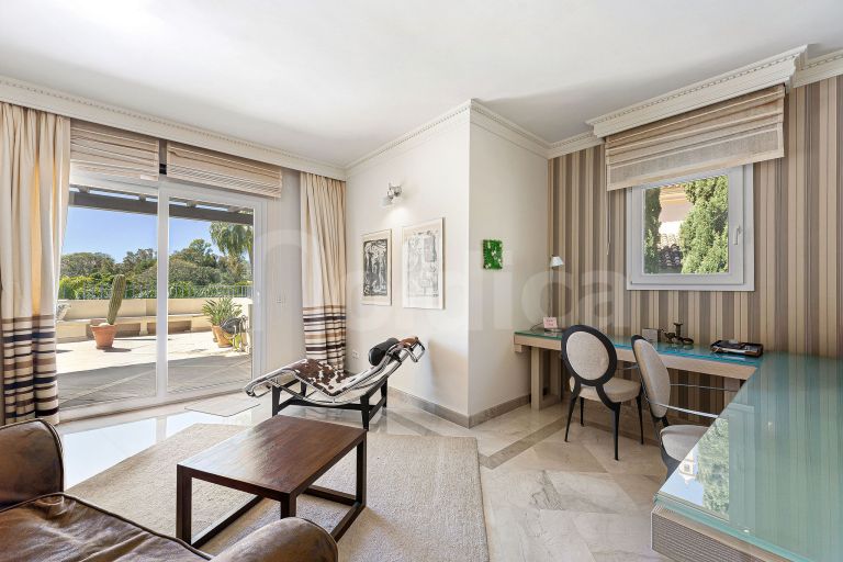 Elegant Duplex Penthouse with Panoramic Views and Expansive Terraces