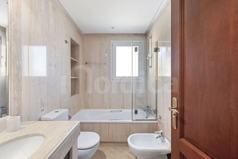 Elegant Duplex Penthouse with Panoramic Views and Expansive Terraces