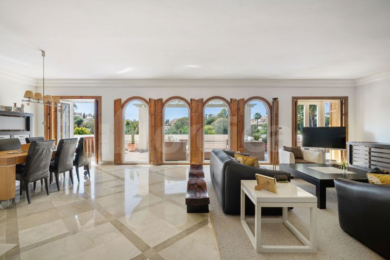 Elegant Duplex Penthouse with Panoramic Views and Expansive Terraces