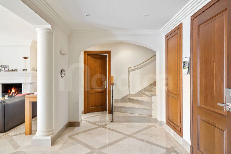 Elegant Duplex Penthouse with Panoramic Views and Expansive Terraces