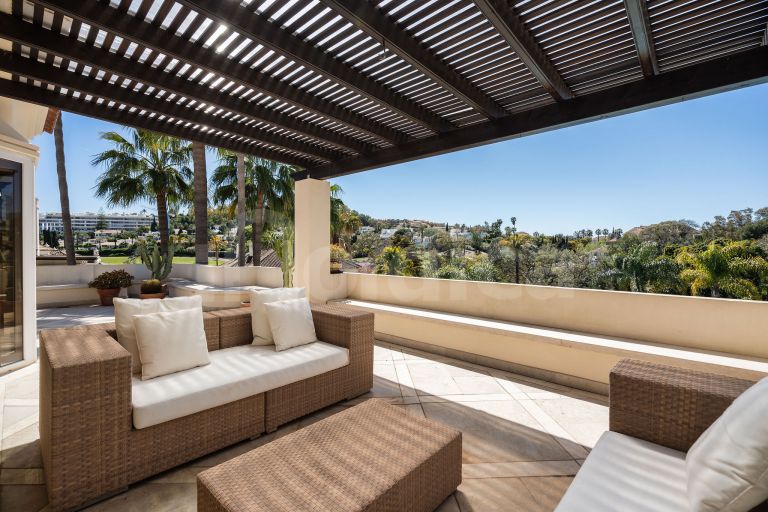 Elegant Duplex Penthouse with Panoramic Views and Expansive Terraces