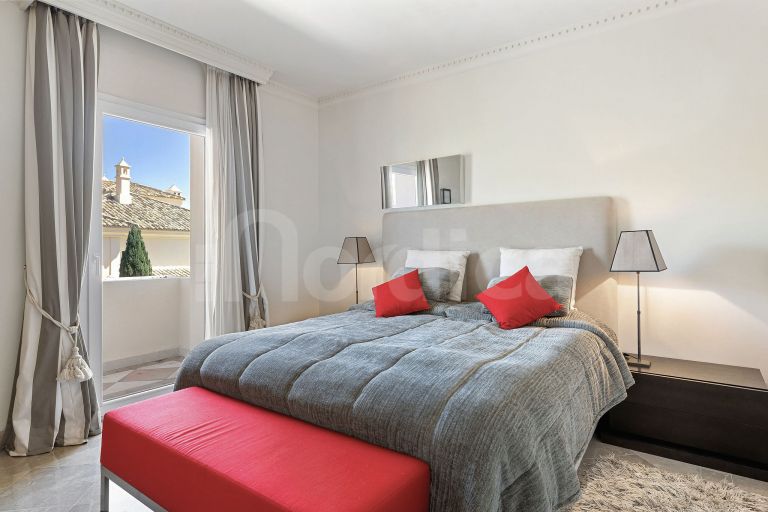 Elegant Duplex Penthouse with Panoramic Views and Expansive Terraces