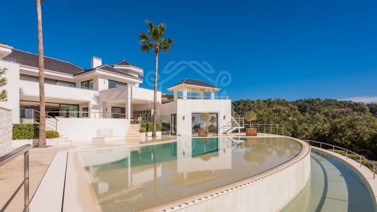 This stunning modern villa in the exclusive La Zagaleta Country Club Estate boasts incredible panoramic sea and mountain views