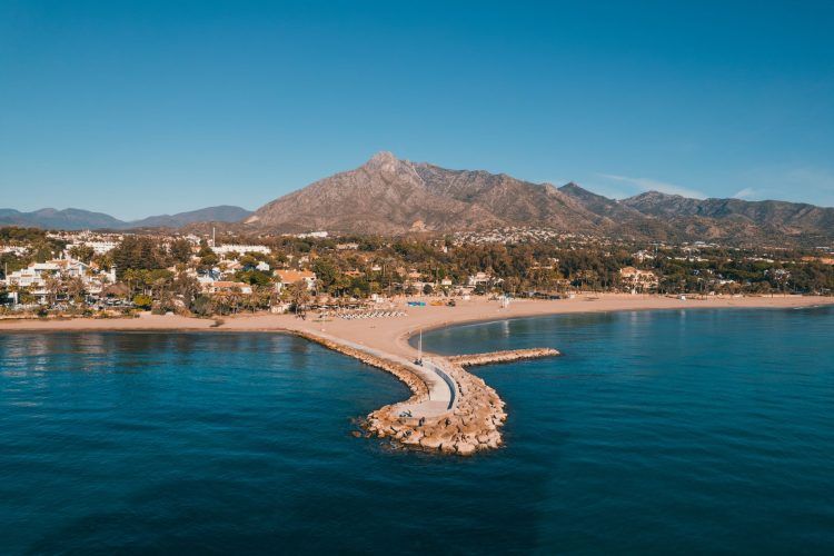 Aerial shot of the Marbella Golden Mile and La Concha Mountain from the sea. 