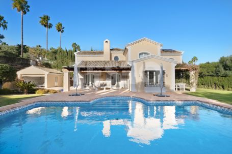 Charming family villa with pretty south facing gardens and lovely views to 2 golf courses