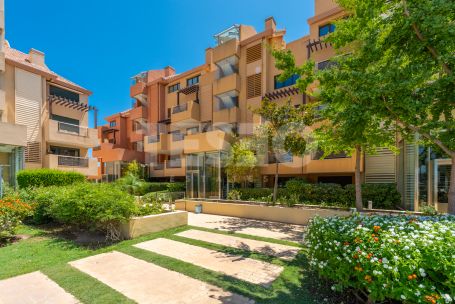 Spacious Ground Floor 3-Bedroom Apartment in Ribera del Marlin, Sotogrande Marina, with Private Garden