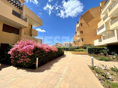Spacious Ground Floor 3-Bedroom Apartment in Ribera del Marlin, Sotogrande Marina, with Private Garden