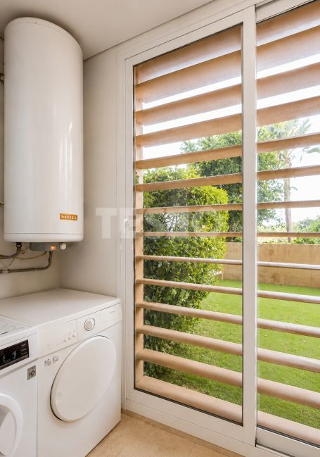 Spacious Ground Floor 3-Bedroom Apartment in Ribera del Marlin, Sotogrande Marina, with Private Garden