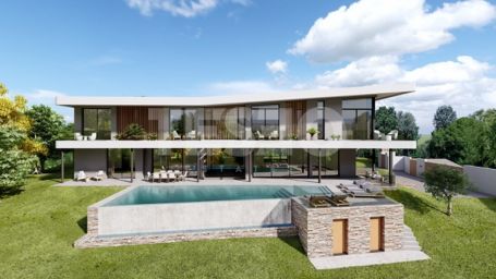 Fantastic plot with licence to build a stunning contemporary house with sea and club house views.