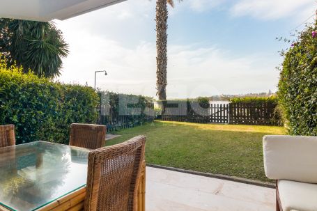 A frontline, river townhouse, located on the sought after Paseo del Rio