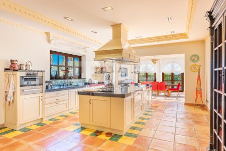 Impressive front-line golf villa in La Reserva area of Sotogrande with a traditional Andaluz exterior