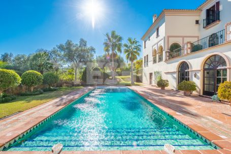 Impressive front-line golf villa in La Reserva area of Sotogrande with a traditional Andaluz exterior