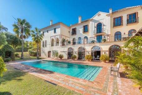 Impressive front-line golf villa in La Reserva area of Sotogrande with a traditional Andaluz exterior
