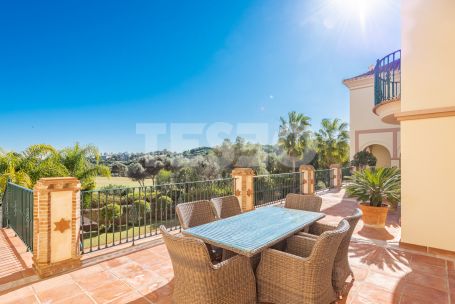 Impressive front-line golf villa in La Reserva area of Sotogrande with a traditional Andaluz exterior