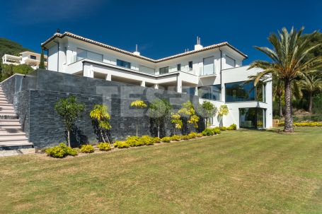 Magnificent 3 storey front line golf villa in La Reserva , with panoramic golf and sea views.