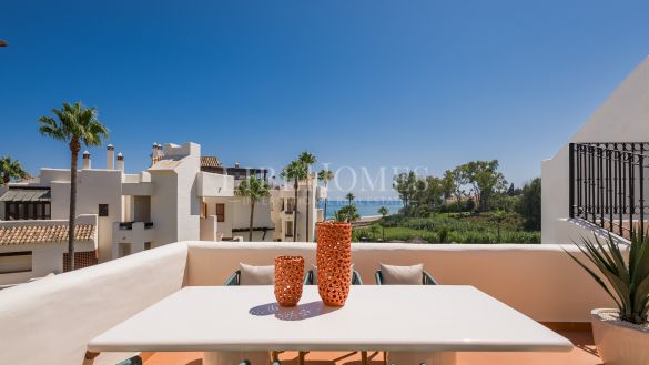 Beachfront duplex penthouse with spectacular sea views in Estepona
