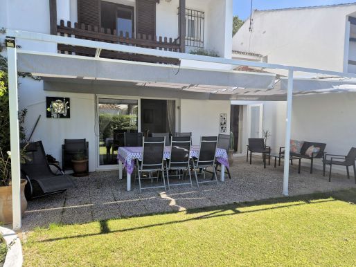 Casa adosada con jardin privado